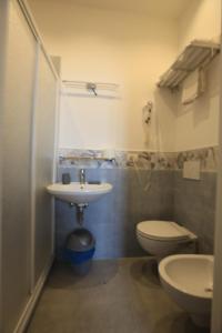 a bathroom with a sink and a toilet at Viviani Raffaella in Monterosso al Mare