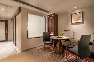 Posezení v ubytování Suning Universal Hotel ALL-SUITES