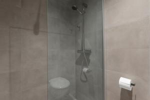 Koupelna v ubytování NN Urban Guesthouse