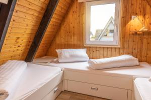Postel nebo postele na pokoji v ubytování 50159 Ferienhaus Catharina