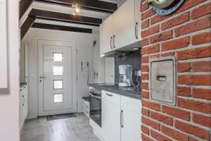 Kuchyň nebo kuchyňský kout v ubytování 50159 Ferienhaus Catharina