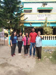 a group of people standing in front of a building at NISARG HOME STAY near Bus Stand Malvan in Malvan