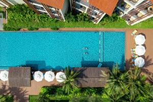 Der Swimmingpool an oder in der Nähe von Dusit Princess Moonrise Beach Resort