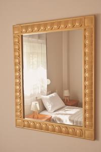A bed or beds in a room at Spiti tou Papa sto Vouno