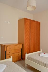 A bed or beds in a room at Spiti tou Papa sto Vouno