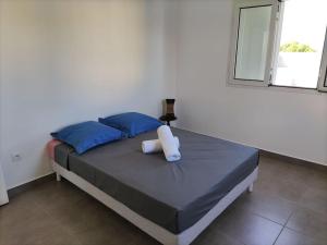 Postel nebo postele na pokoji v ubytování Maison avec barbecue