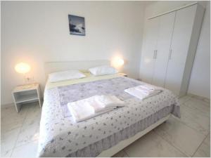 Katil atau katil-katil dalam bilik di Villa Isabella