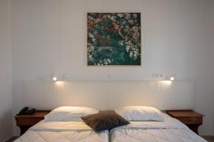 Кровать или кровати в номере Sea Breeze Hotel