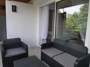 Posedenie v ubytovaní Le Marceau - Terrasse plein sud
