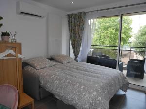 Posteľ alebo postele v izbe v ubytovaní Le Marceau - Terrasse plein sud