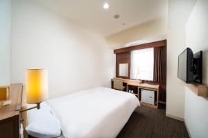 TV a/nebo společenská místnost v ubytování KOKO HOTEL Sapporo Ekimae
