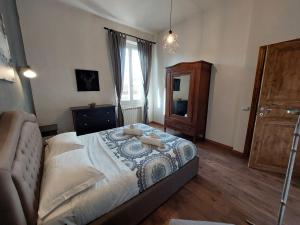 Postel nebo postele na pokoji v ubytování Savieri Home in Florence