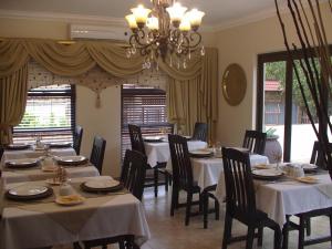 Restoran või mõni muu söögikoht majutusasutuses Villa Xanelle Boutique Guest House