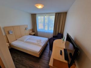 Postel nebo postele na pokoji v ubytování Nordic Avantage Hotel + 25 fotografií