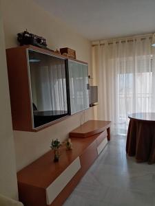TV a/nebo společenská místnost v ubytování Piso en Güejar Sierra