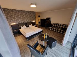 Postel nebo postele na pokoji v ubytování Nordic Avantage Hotel