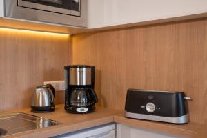 Kuchyň nebo kuchyňský kout v ubytování Residence Residéal Antibes