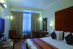 TV a/nebo společenská místnost v ubytování Regency Hotel