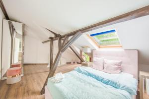 Ένα ή περισσότερα κρεβάτια σε δωμάτιο στο Mediterrane Maisonette-traumhaftes Feriendomizil