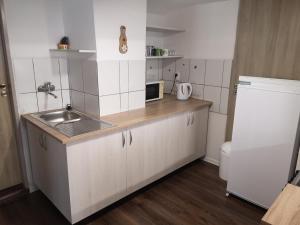 Dapur atau dapur kecil di Apartmán u Moniky +7 gambar