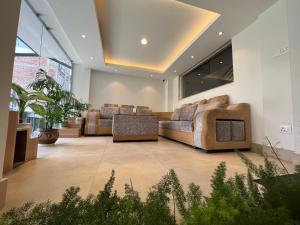 Χώρος καθιστικού στο Hotel New Era
