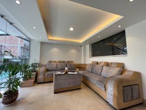 Χώρος καθιστικού στο Hotel New Era