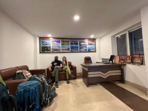 Χώρος καθιστικού στο Hotel New Era