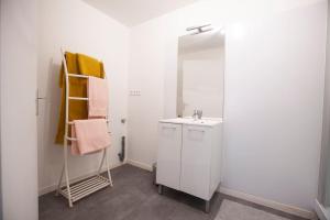 Kúpeľňa v ubytovaní Le gîte de la Cour des Arts