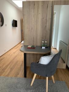 TV a/nebo společenská místnost v ubytování Hotel Restaurant Schwarzer Adler