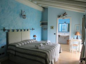Ein Bett oder Betten in einem Zimmer der Unterkunft B&B Il Filo'