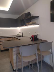 A kitchen or kitchenette at Casa Vacanze - Green Garden