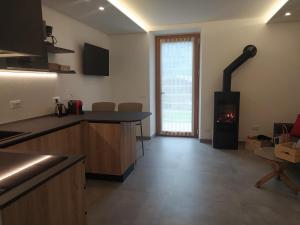 A kitchen or kitchenette at Casa Vacanze - Green Garden