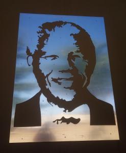 a picture of a woman silhouette with the sky in the background at Big Five Guest House in Mthatha