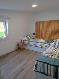 Кровать или кровати в номере La Veiga Romana