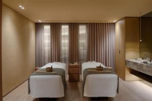 Postel nebo postele na pokoji v ubytování Six Senses Rome