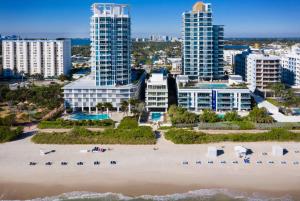 an aerial view of a beach in front of buildings at MB Hotel, Trademark Collection by Wyndham in Miami Beach