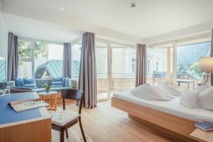 Letto o letti in una camera di Hotel Kendler