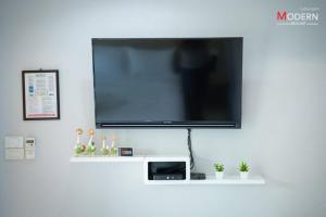 TV a/nebo společenská místnost v ubytování Modern Resort