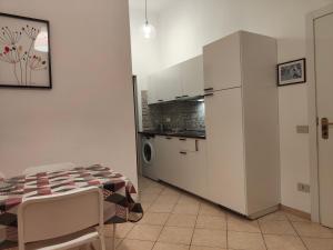 A kitchen or kitchenette at Residence Hotel Vittoria