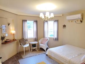Voodi või voodid majutusasutuse Olive Vanilla Pension toas