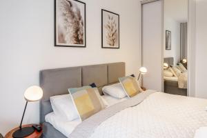 Posteľ alebo postele v izbe v ubytovaní Balticus 16A by Noclegi Renters