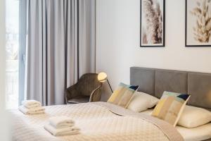 Posteľ alebo postele v izbe v ubytovaní Balticus 16A by Noclegi Renters