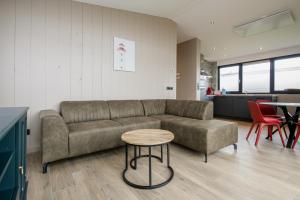 Χώρος καθιστικού στο Vakantiehuis Zonnig Zuid - Julianadorp aan Zee