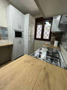A kitchen or kitchenette at Casa Rural La Moraleja