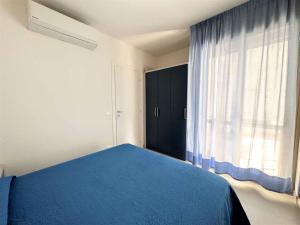 A bed or beds in a room at Apartment in Bibione 35830