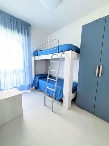 A bed or beds in a room at Apartment in Bibione 35830
