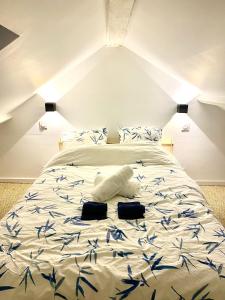 Voodi või voodid majutusasutuse La persienne Bleue - Coeur historique de Mortagne au Perche toas