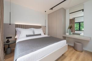 Кровать или кровати в номере "Villa AnMari" The Cavtat View Residence