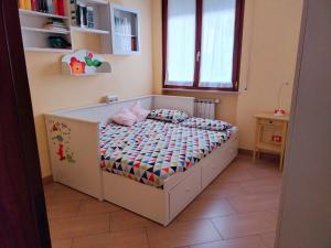 Кровать или кровати в номере Sunnyside Accademia