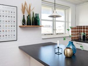 Kuchyň nebo kuchyňský kout v ubytování Holiday home Ulfborg VIII